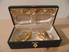 Paire de saleron en porcelaine doré signé Robj en forme de sabot