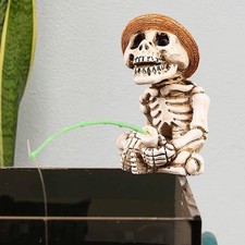 Statue de squelette de pêche