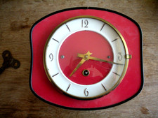 Horloge pendule à clé fonctionne  Formica rouge clé fournie