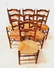 suite de six chaises assises paille en bois teinté merisier . XX siècle .