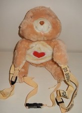 Peluche BISOUNOURS sac à dos