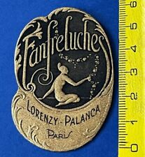 ETIQUETTE  PARFUM ANCIENNE /FANFRELUCHE/ FEMME DOREE/RELIEF/ LORENZY PALANCA
