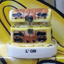 Fève en porcelaine Un coffre