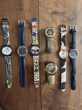 Lot de Cinq montres Swatch et deux montres Akteo