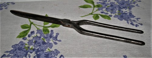 Ancien fer friser - à, marqué