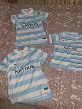 polo  bleu et blanc neuve