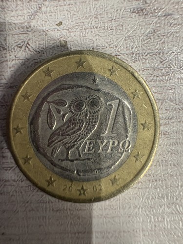 Pièce hibou avec s - 1€,