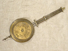 Ancien balancier décor floral