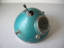 Ancien phare de moto compteur