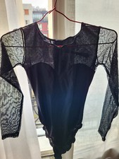 Justaucorps noir aspect plumetis