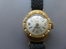 montre femme ancienne mécanique LX plaqué or poinçon fonctionne tb