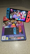 Nintendo Switch OLED - Bleu Néon/Rouge Néon Avec Mario Kart 8 Deluxe Intégré 