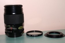 Objectif Revuenon 135 mm 2,8 M42 + bague EOS + filtre 1A