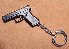vintage porte clé Pistolet