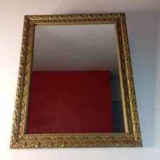 Ancien miroir avec cadre doré ornemental vintage