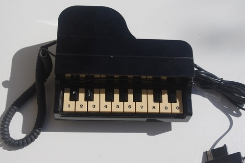 Télephone piano vintage bon