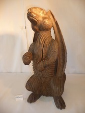 Sculpture en bois lièvre assis