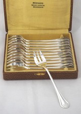 Christofle Printania 12 fourchettes à huitres, métal argenté, en excellent état.