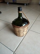 Dame jeanne en verre et osier