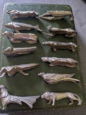  12 portes couteaux Sandoz