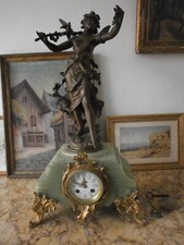 pendule en régule signé