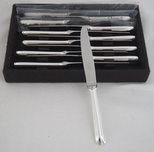 Christofle América, 12 couteaux à entremets, dessert, fromage, proches du neuf.
