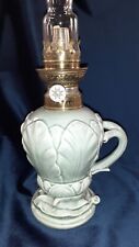 Ancienne lampe à pétrole en faience barbotine 19eme céladon
