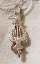 Ancienne boucle de ciseaux en