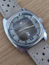 Beautiful and rare Enicar day-date with faceted crystal 