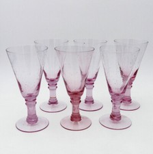 Biot [Dans le goût de], six très grands verres rose à violet clair, XXe siècle.