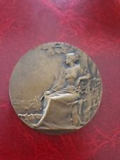 Médaille  Signé René