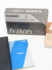 Calculatrice scientifique Casio fx-180P , avec boite et notices , fonctionnelle.