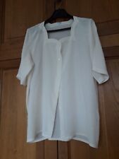 Beau chemisier en soie beige