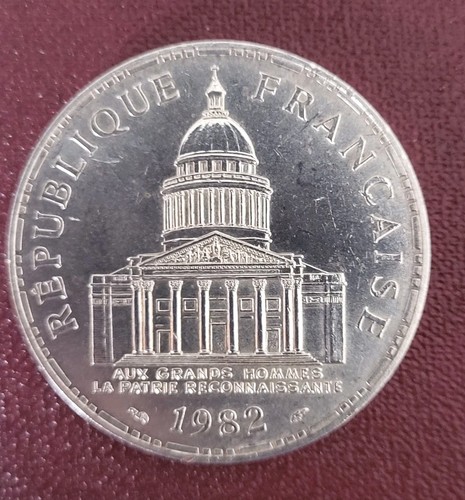 Une piece 100 francs - ,