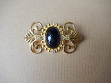 BROCHE  COULEUR OR SIGNEE