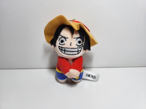 Petite peluche porte clé - porte,