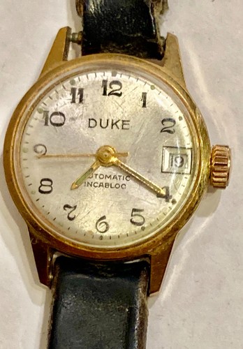 Ancienne montre femme - de,