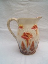 Ancien pichet en barbotine