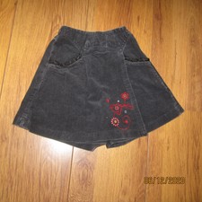 JUPE SHORT EN VELOURS NOIR CATIMINI  3/4 ANS BON ETAT 