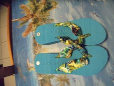 Tong bleu turquoise Neuve pointure 39 mais c'est plus un 38 