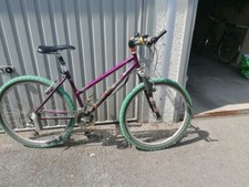 vtt femme MBK avec fourche rock chox à l'avant bon état