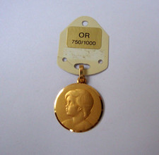 1 Médaille massive -Téte d'ange- en OR 18 carats diamétre 16mm poids 1gr80