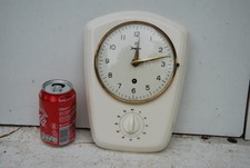 1 pendule mécanique JUNGHANS H 420 céramique avec minuteur et sans clé en l'état