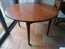 Table ronde pliante en acajou massif