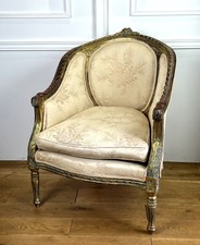 FAUTEUIL BERGERE  ANCIEN EN BOIS DORÉ ET SCULPTÉ DE STYLE LOUIS XVI