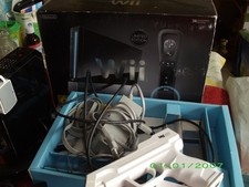 lot console wii avec accessoires et figurines et jeux