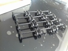 ENSEMBLE DE 12 PORTE COUTEAUX EN FER  Forgé vintage en boite