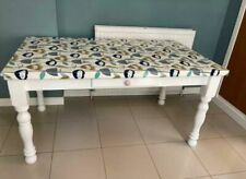 Farmhouse style dining table with oilcloth top