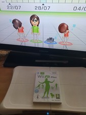 BALANCE BOARD WII FIT + JEU Nintendo Wii fit Fonctionne bien voir les photos .