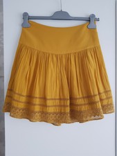 Jupe mi-longue Camaïeu jaune moutarde, à dentelle. Taille 34
